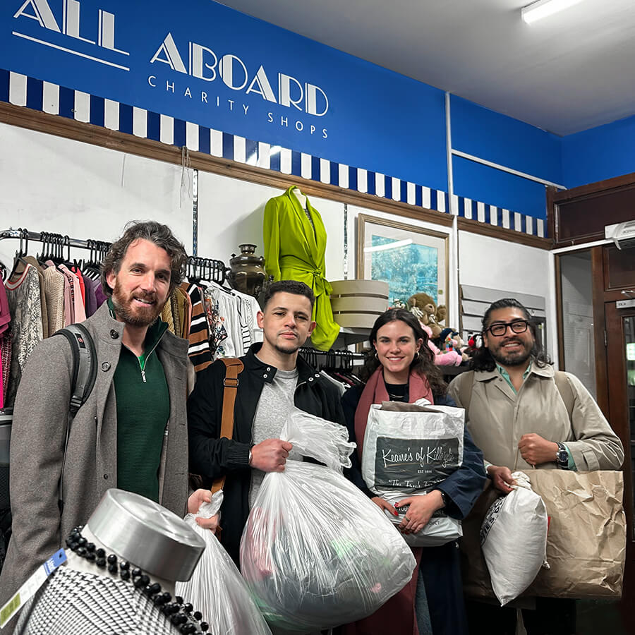 Insighters donating at a charity shop