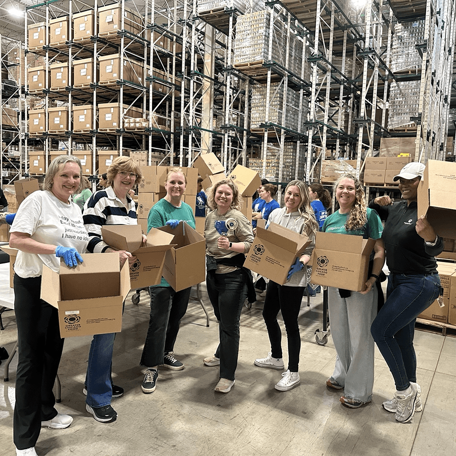 Insighters volunteering at a food depository